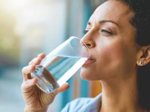 Woman drinking a glass of water